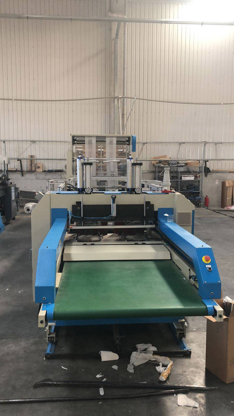 Our Turkey customer ordered a automatic T-Shirt bag making machine. (HG2P - 502SA)