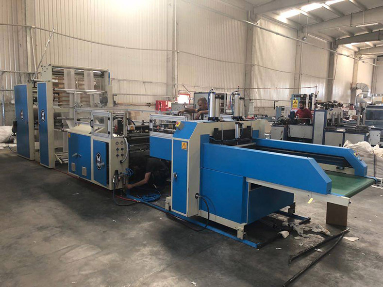 Our Turkey customer ordered a automatic T-Shirt bag making machine. (HG2P - 502SA)